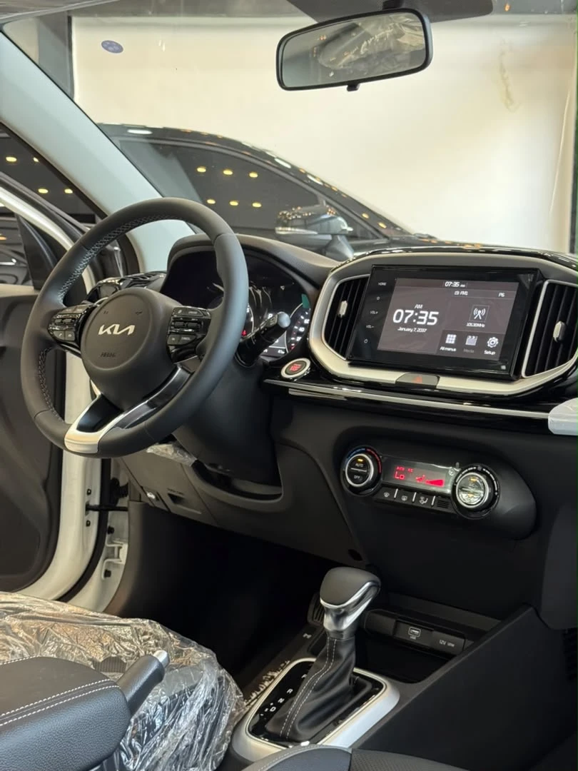 2026 Kia KX1 — foto 12