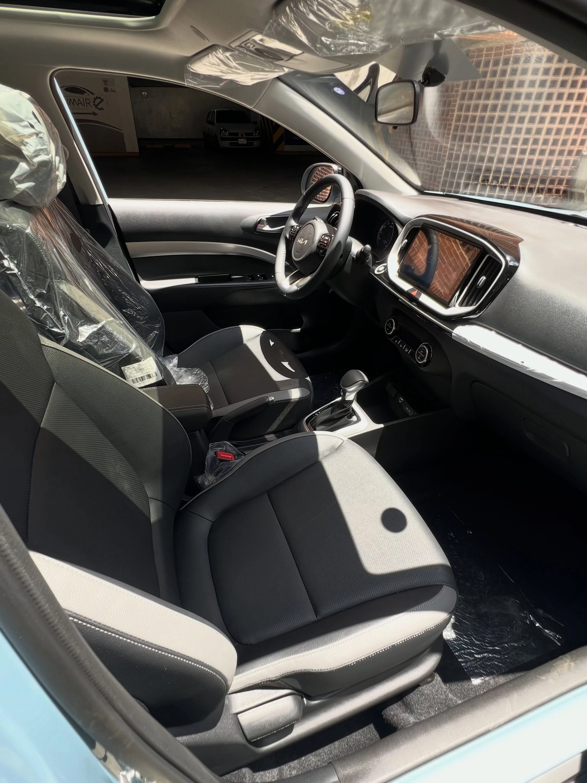 2026 Kia KX1 — foto 11