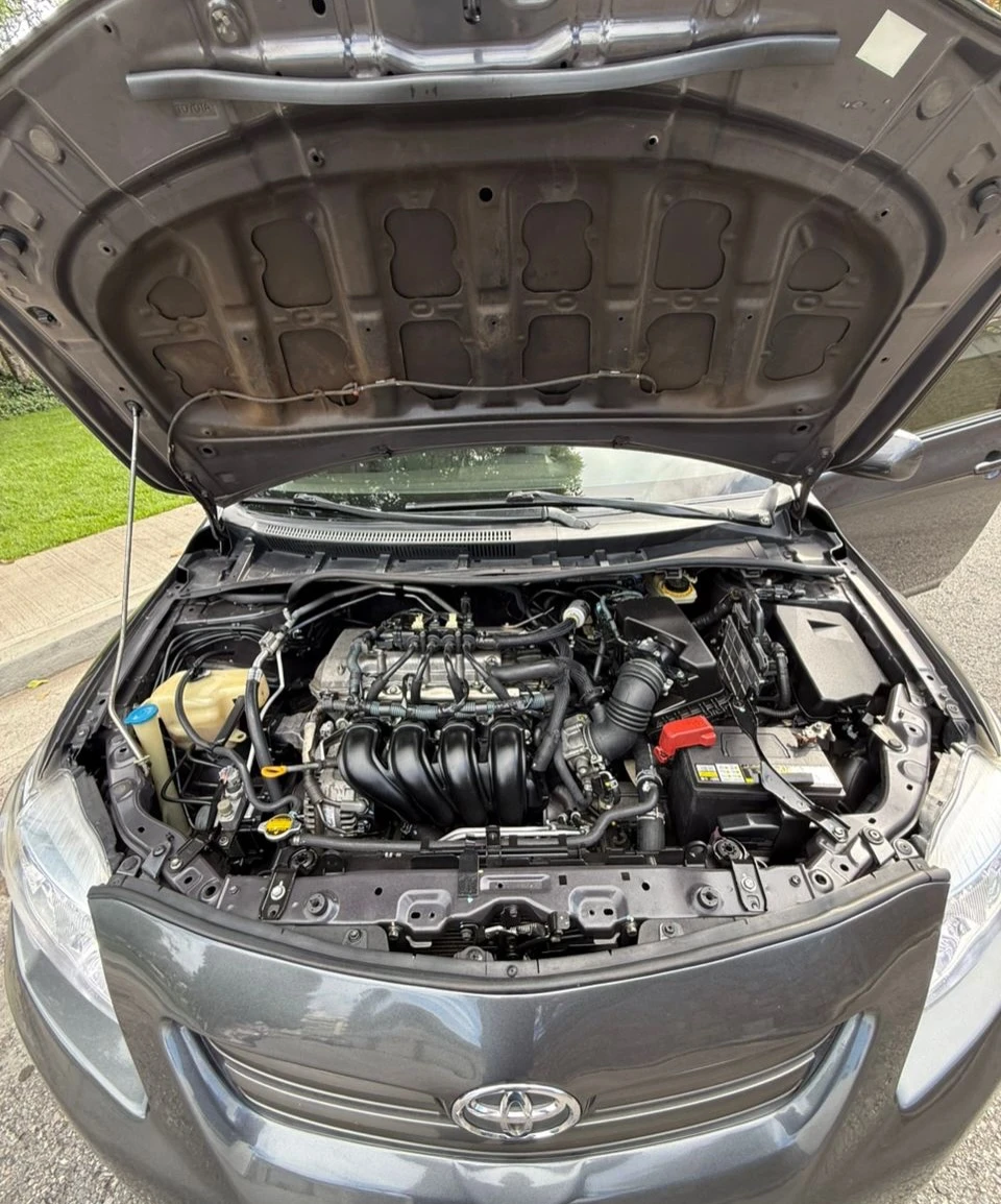 2011 Toyota Corolla Xei — foto 10
