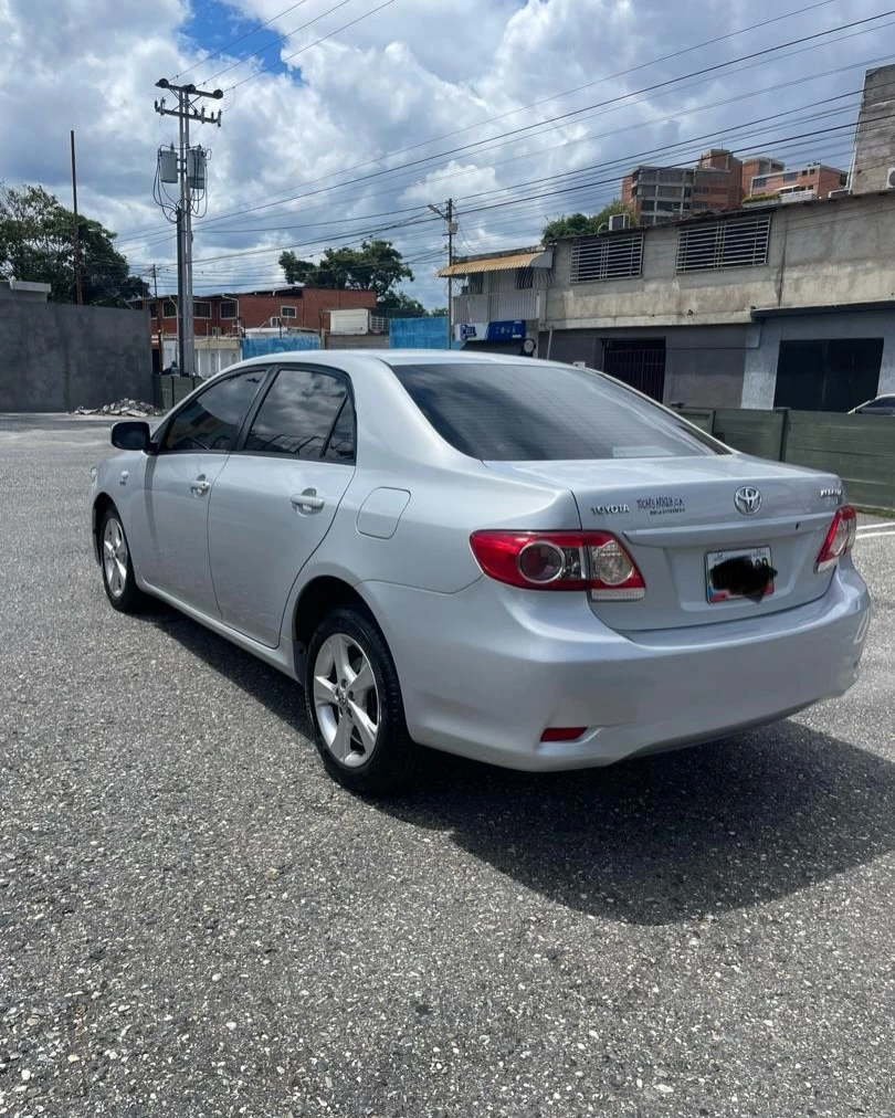 2013 Toyota Corolla Xei — foto 2