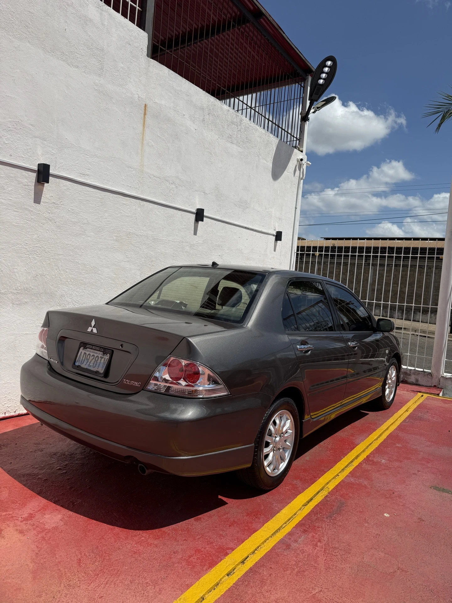 2012 Mitsubishi Lancer Touring Full — foto 2