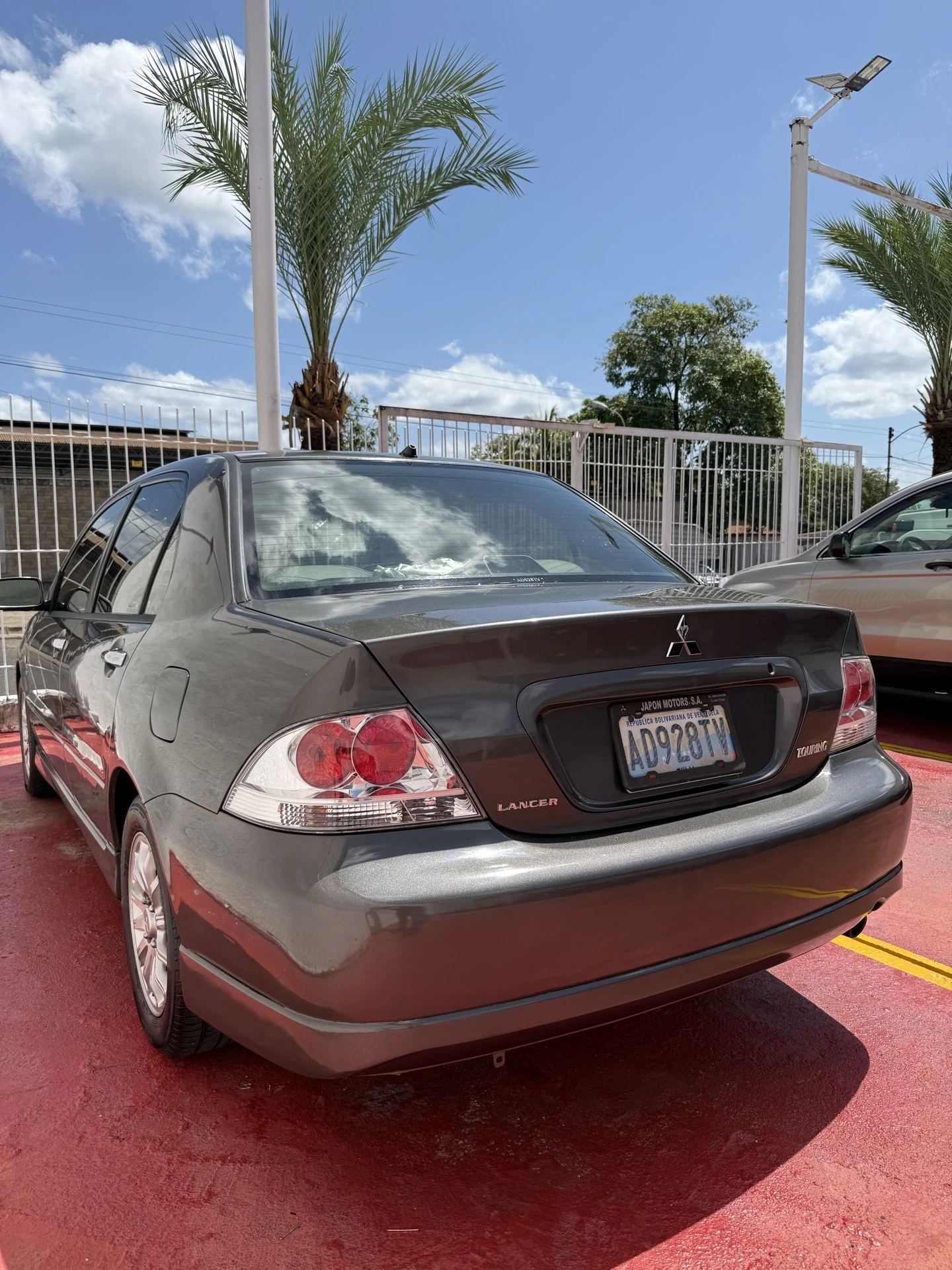 2012 Mitsubishi Lancer Touring Full — foto 3